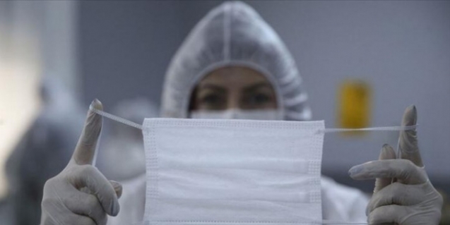 Kargo geldiğinde kapıyı maske ile açın