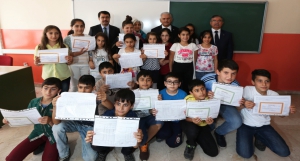 Bakan Yılmaz, Başbakan Yıldırım ile birlikte karne dağıtım törenine katıldı